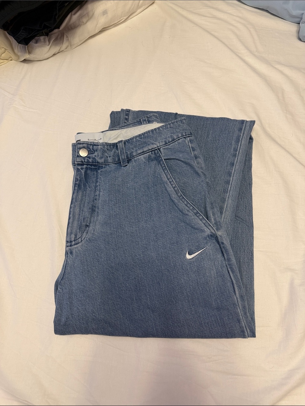 Nike Men’s Dark Blue Relaxed Denim Jeans with White Swoosh